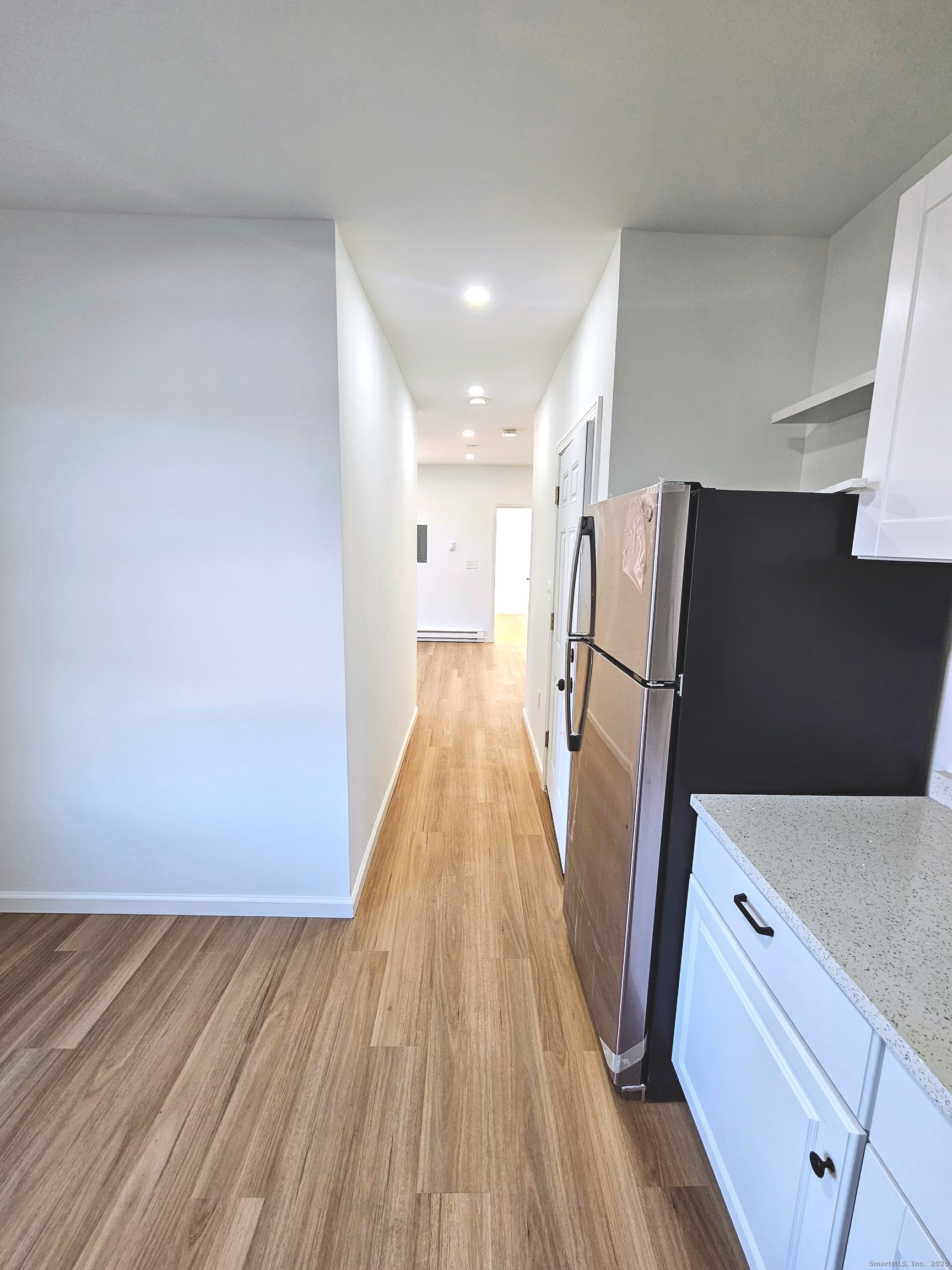 1153 Main Street, Unit 3A Windham, CT 06226 - Photo 3 of 13 Great sight line from the kitchen to the living room