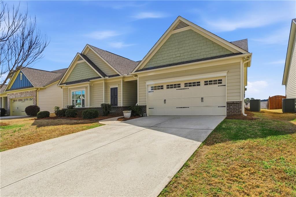 4479 Clubside Drive Gainesville, GA 30504 - Photo 11 of 47 a view of a house next to a yard