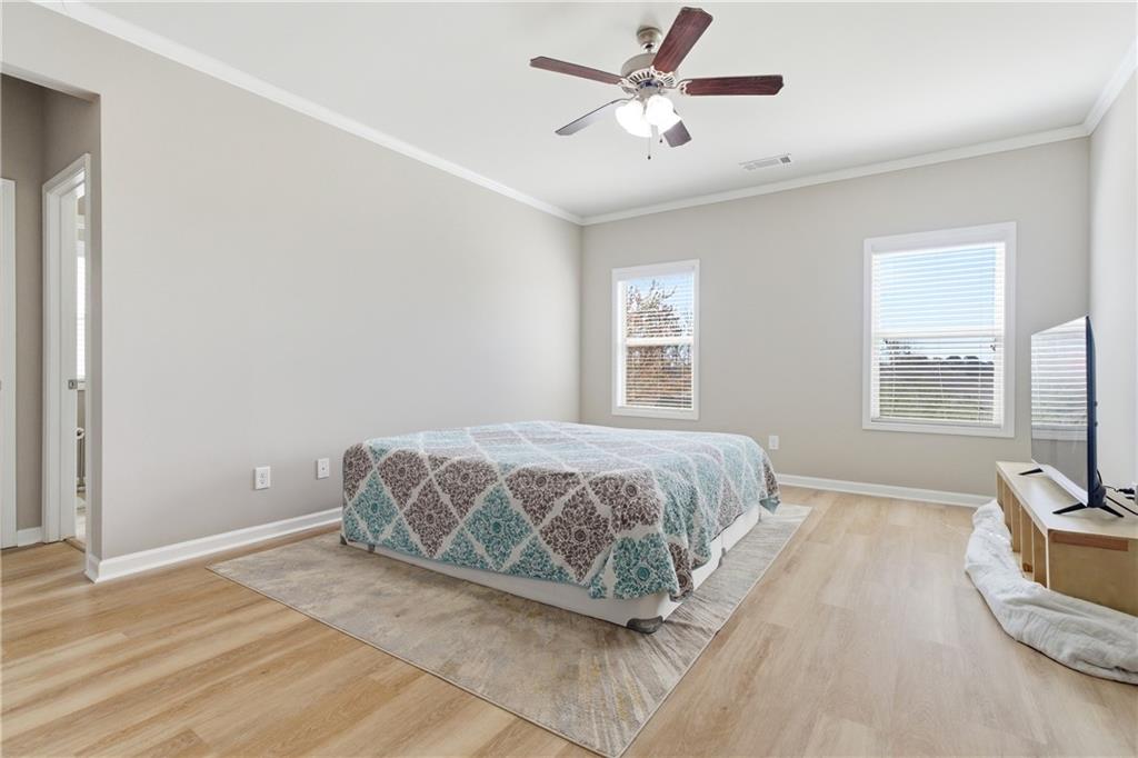 4479 Clubside Drive Gainesville, GA 30504 - Photo 18 of 47 a bedroom with a large bed and a window