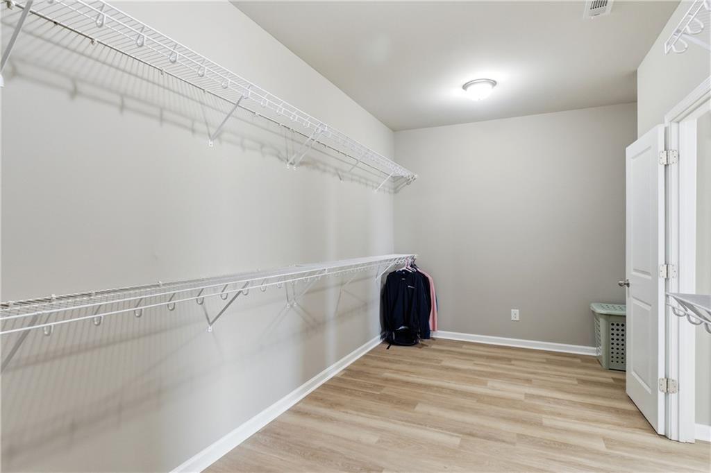 4479 Clubside Drive Gainesville, GA 30504 - Photo 27 of 47 a view of a room with racks on the wall