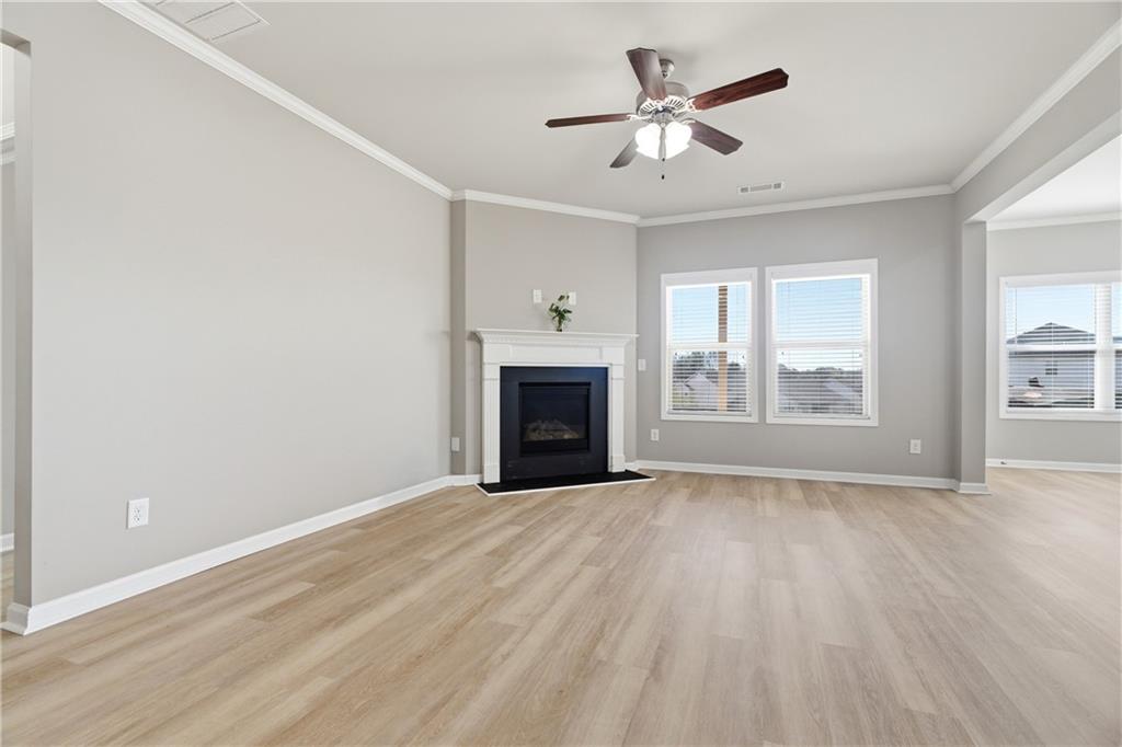 4479 Clubside Drive Gainesville, GA 30504 - Photo 35 of 47 an empty room with fan and windows