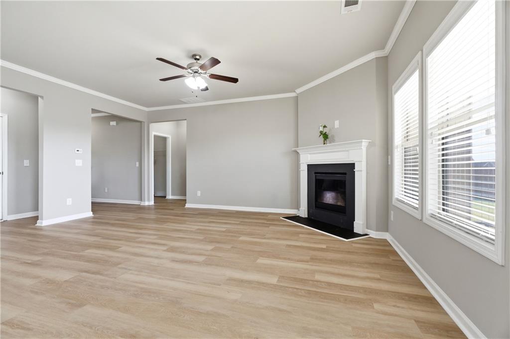 4479 Clubside Drive Gainesville, GA 30504 - Photo 37 of 47 a view of an empty room with a fireplace and a window