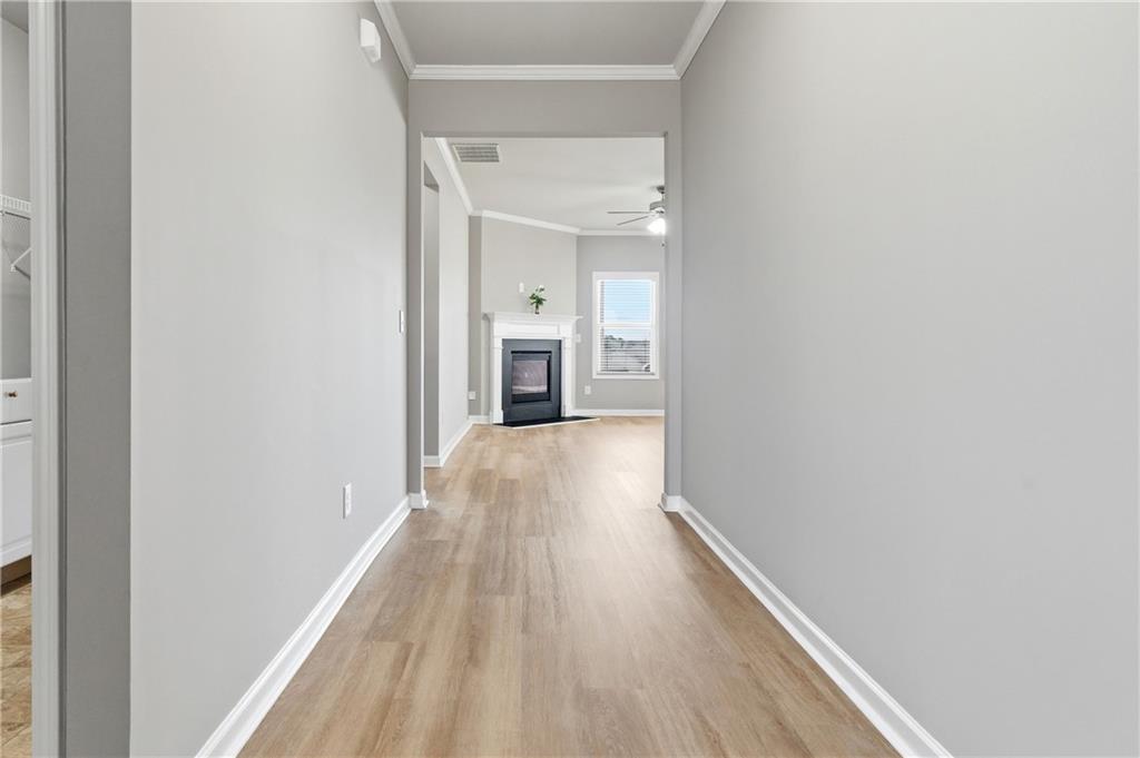 4479 Clubside Drive Gainesville, GA 30504 - Photo 38 of 47 a view of a hallway with wooden floor