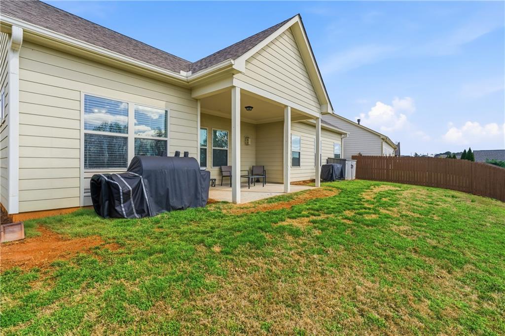 4479 Clubside Drive Gainesville, GA 30504 - Photo 6 of 47 a view of backyard with a garden and deck