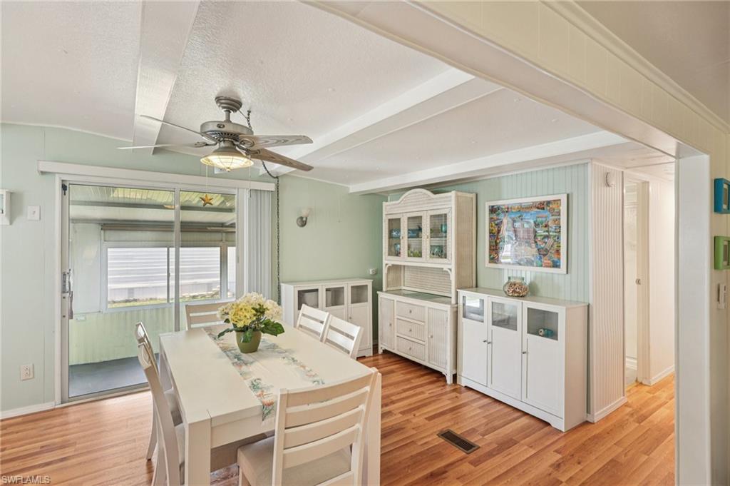 104 Willow Lane, Unit 30 Naples, FL 34114 - Photo 13 of 30 Dining space featuring ceiling fan and light wood-style flooring
