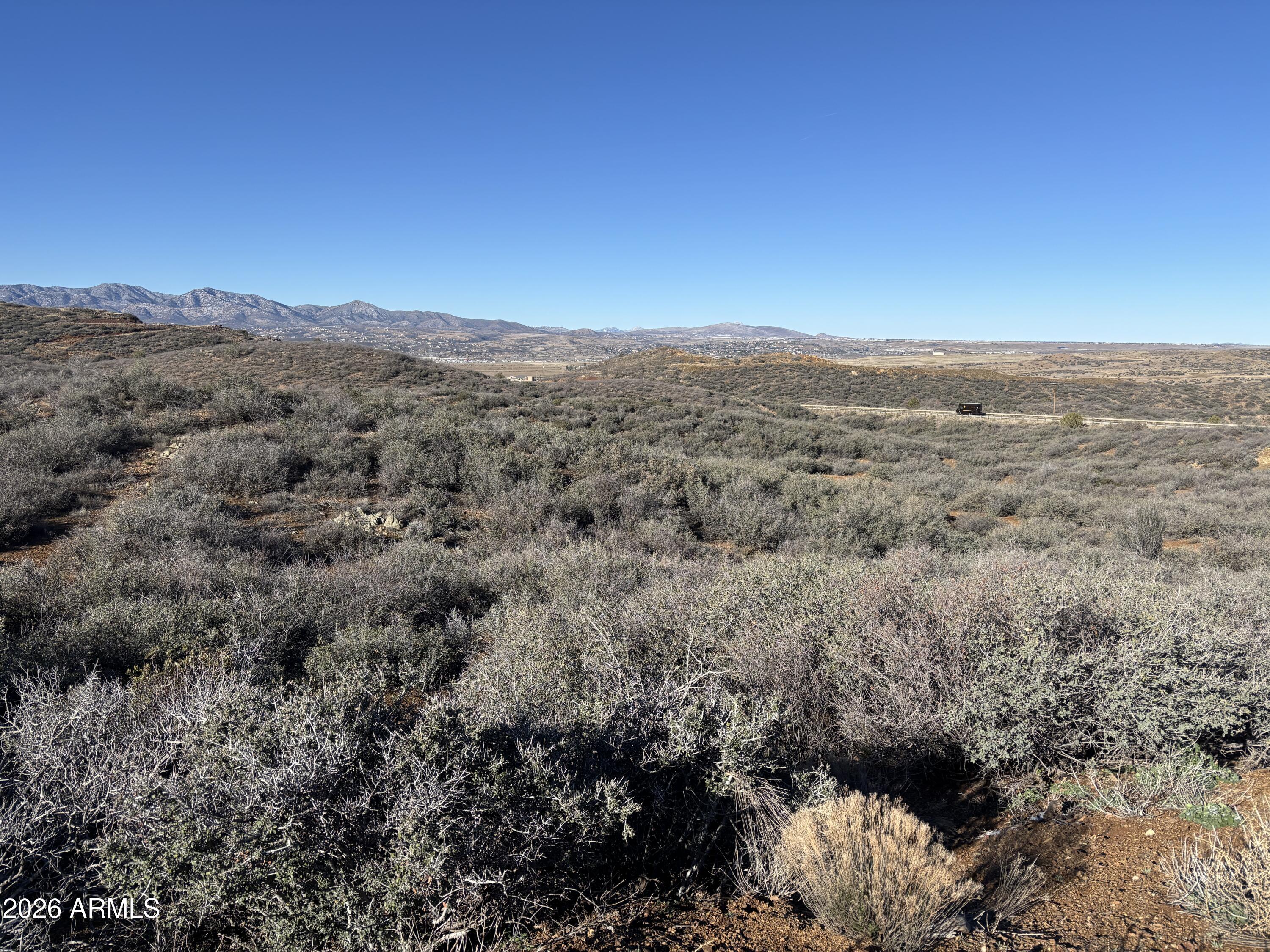 64 South Dewey Overlook Way Dewey, AZ 86327 - Photo 11 of 19 a view of a city with lush green forest