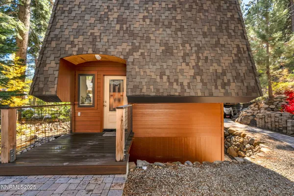 a view of a wooden door of the house