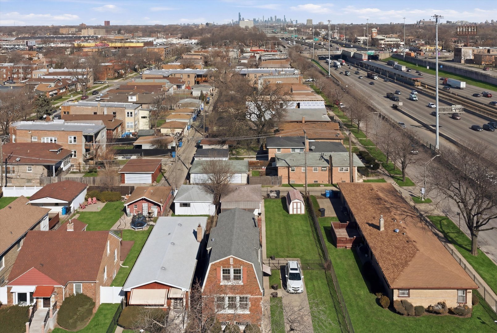 40 West 81st Street Chicago, IL 60620 - Photo 3 of 8 an aerial view of a city with lots of residential buildings