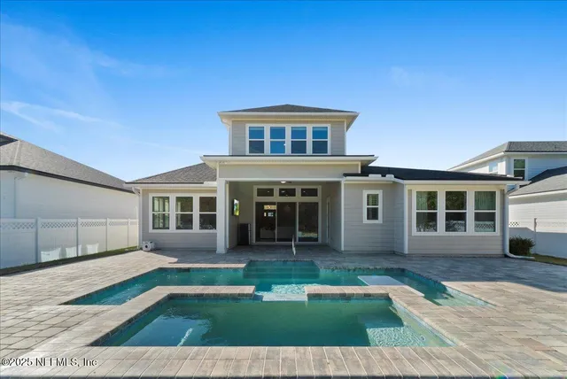a view of house with yard outdoor seating and entertaining space