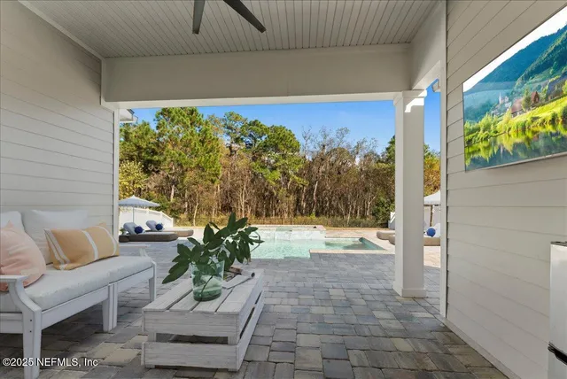 a view of a porch with furniture