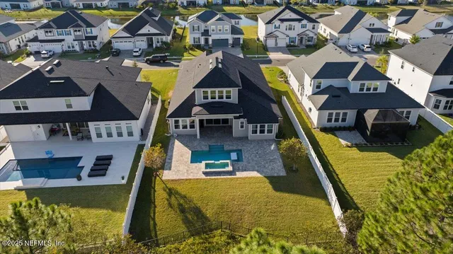 a view of a house with swimming pool
