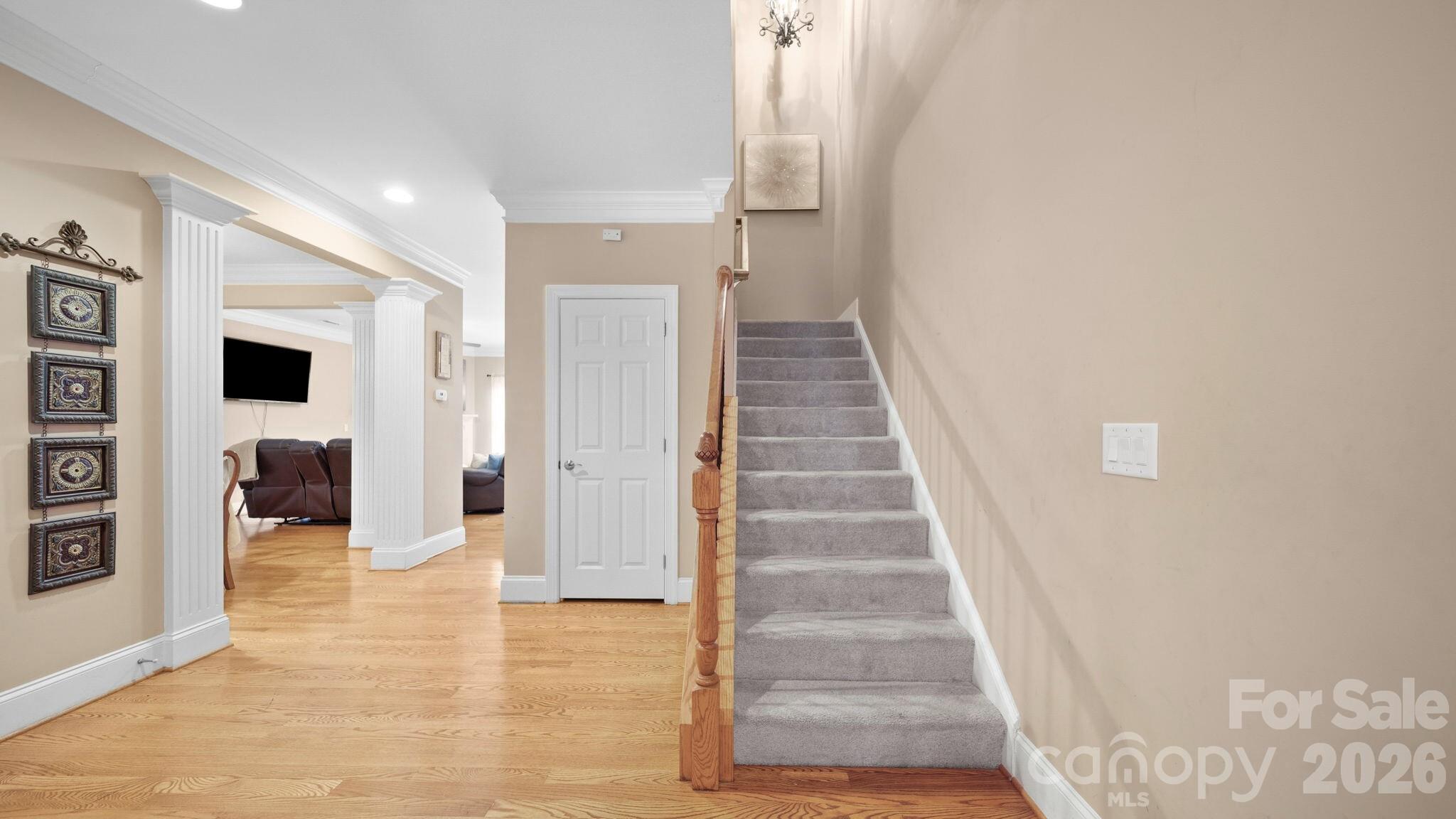 804 Talking Stick Lane Fort Mill, SC 29708 - Photo 15 of 34 a view of a hallway with wooden floor and staircase