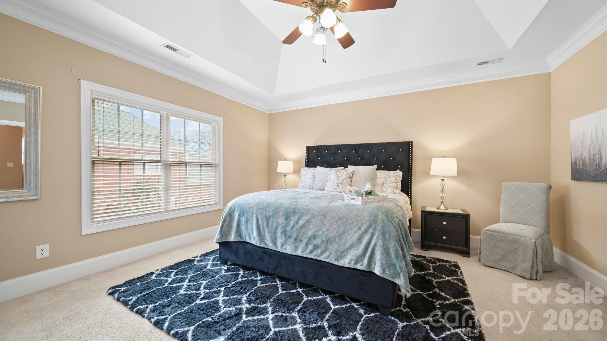 804 Talking Stick Lane Fort Mill, SC 29708 - Photo 16 of 34 a bedroom with a large bed and a window