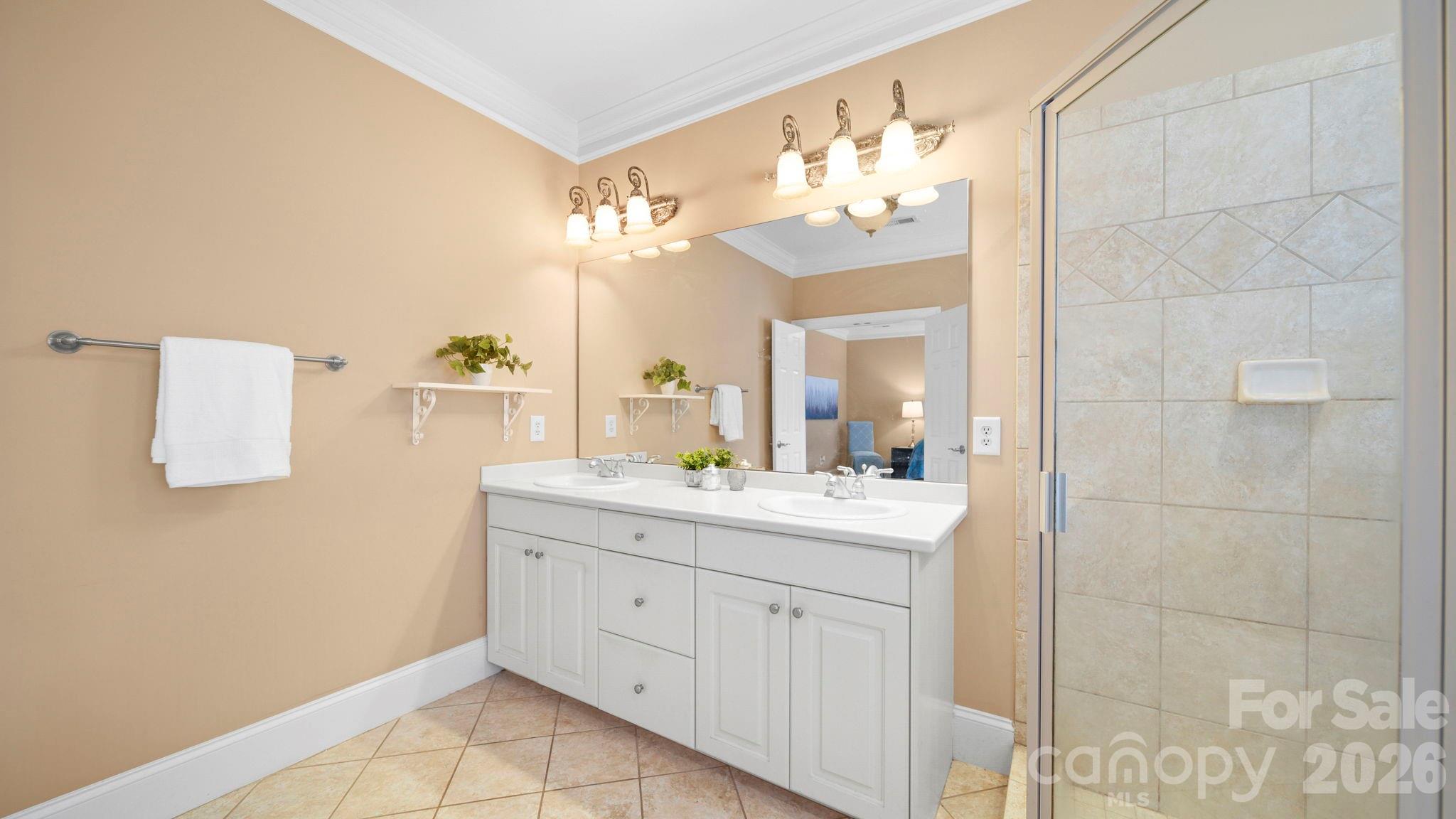 804 Talking Stick Lane Fort Mill, SC 29708 - Photo 17 of 34 a bathroom with a granite countertop sink a toilet and a mirror