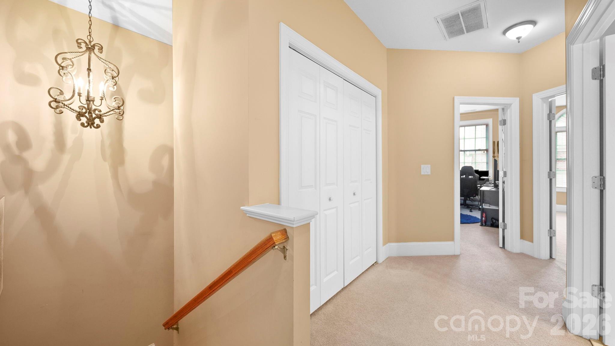 804 Talking Stick Lane Fort Mill, SC 29708 - Photo 20 of 34 a view of a hallway with wooden floor and entryway