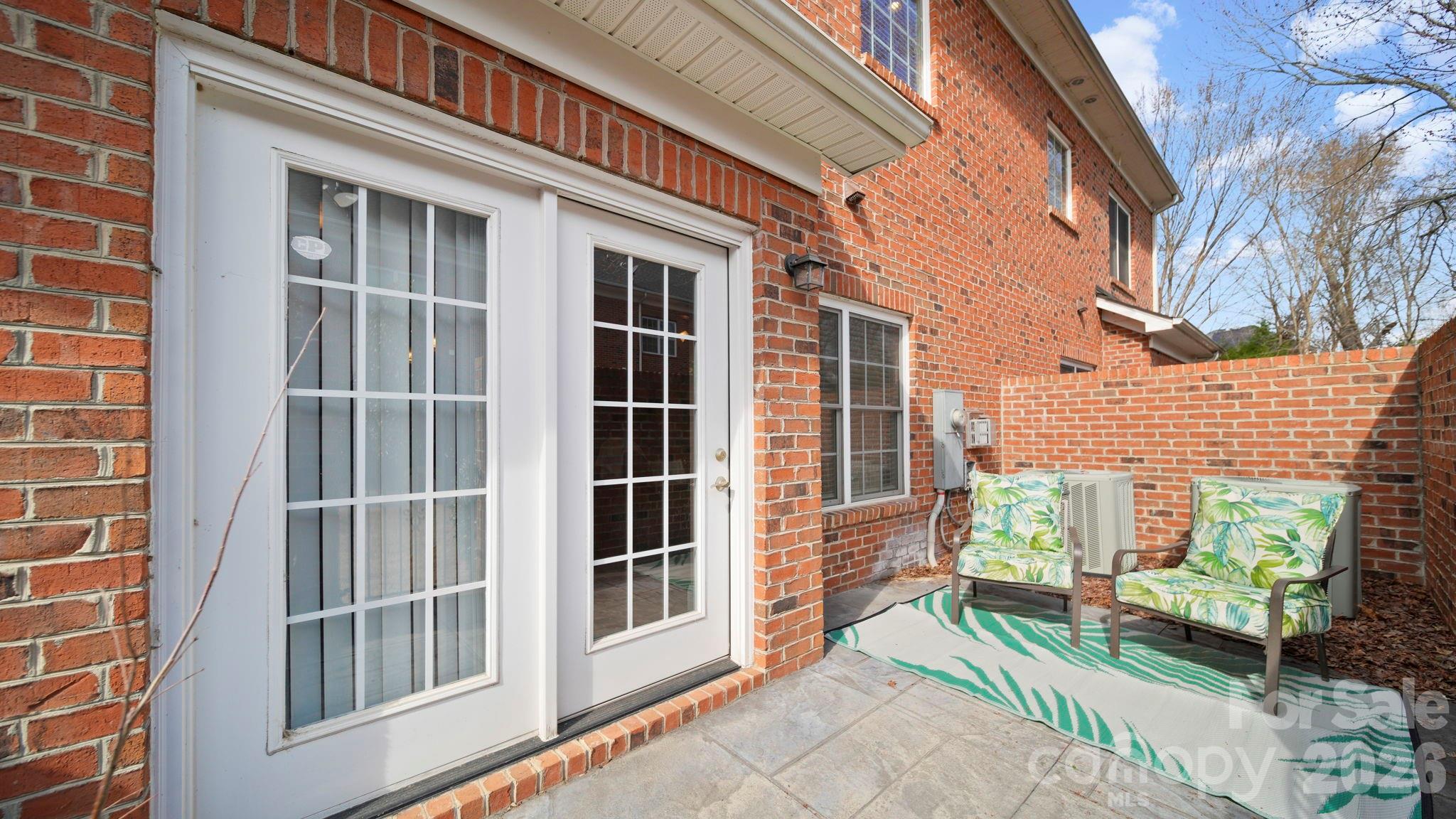 804 Talking Stick Lane Fort Mill, SC 29708 - Photo 26 of 34 a view of a building with a window and bench