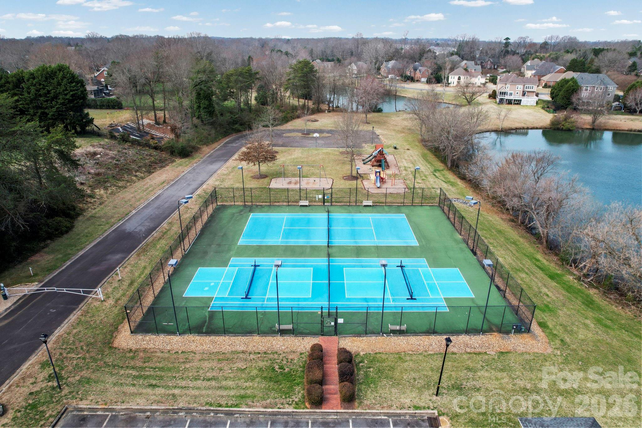 804 Talking Stick Lane Fort Mill, SC 29708 - Photo 6 of 34 a view of a backyard with a lake view
