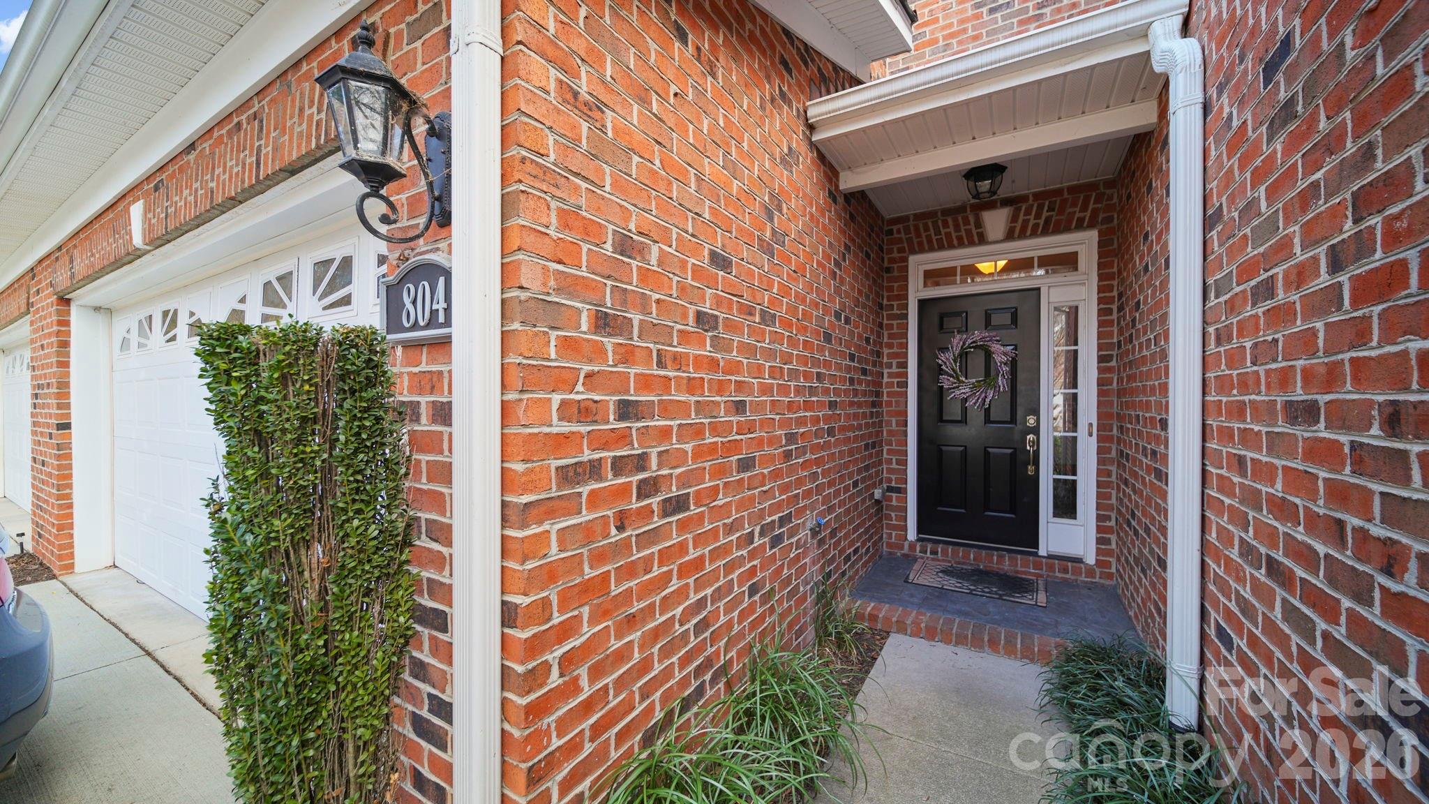 804 Talking Stick Lane Fort Mill, SC 29708 - Photo 7 of 34 a view of a door and brick walls