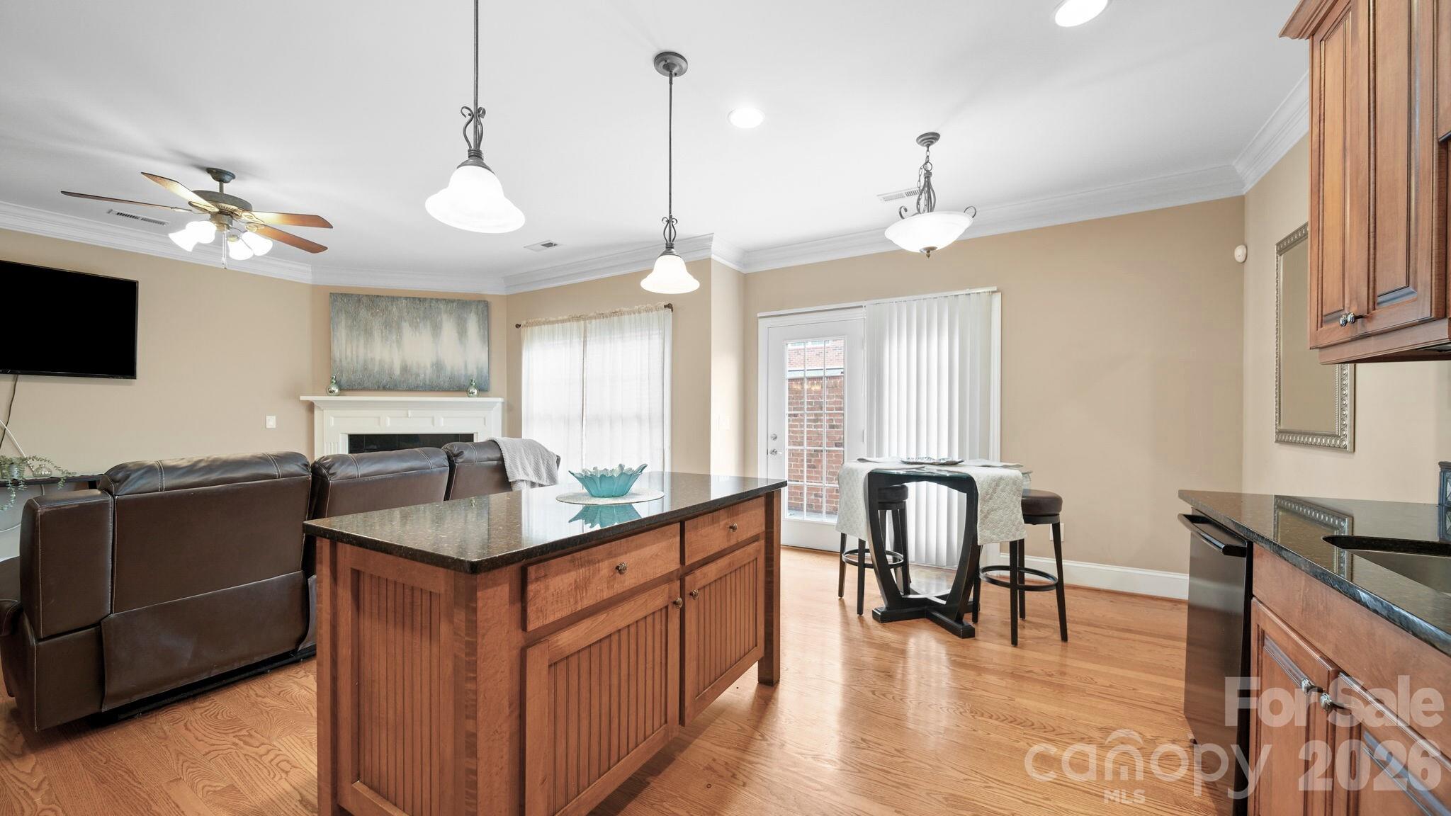 804 Talking Stick Lane Fort Mill, SC 29708 - Photo 9 of 34 a kitchen with counter top space appliances and a ceiling fan