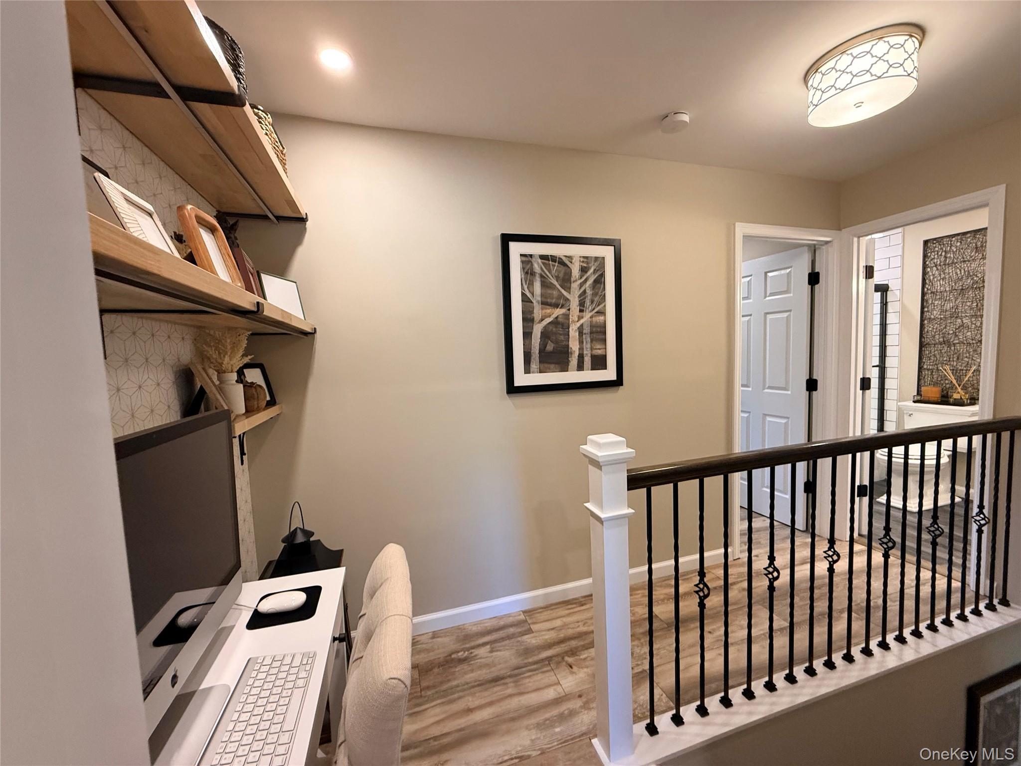 9 Penn Commons Yaphank, NY 11980 - Photo 14 of 34 a view of hallway with window and furniture