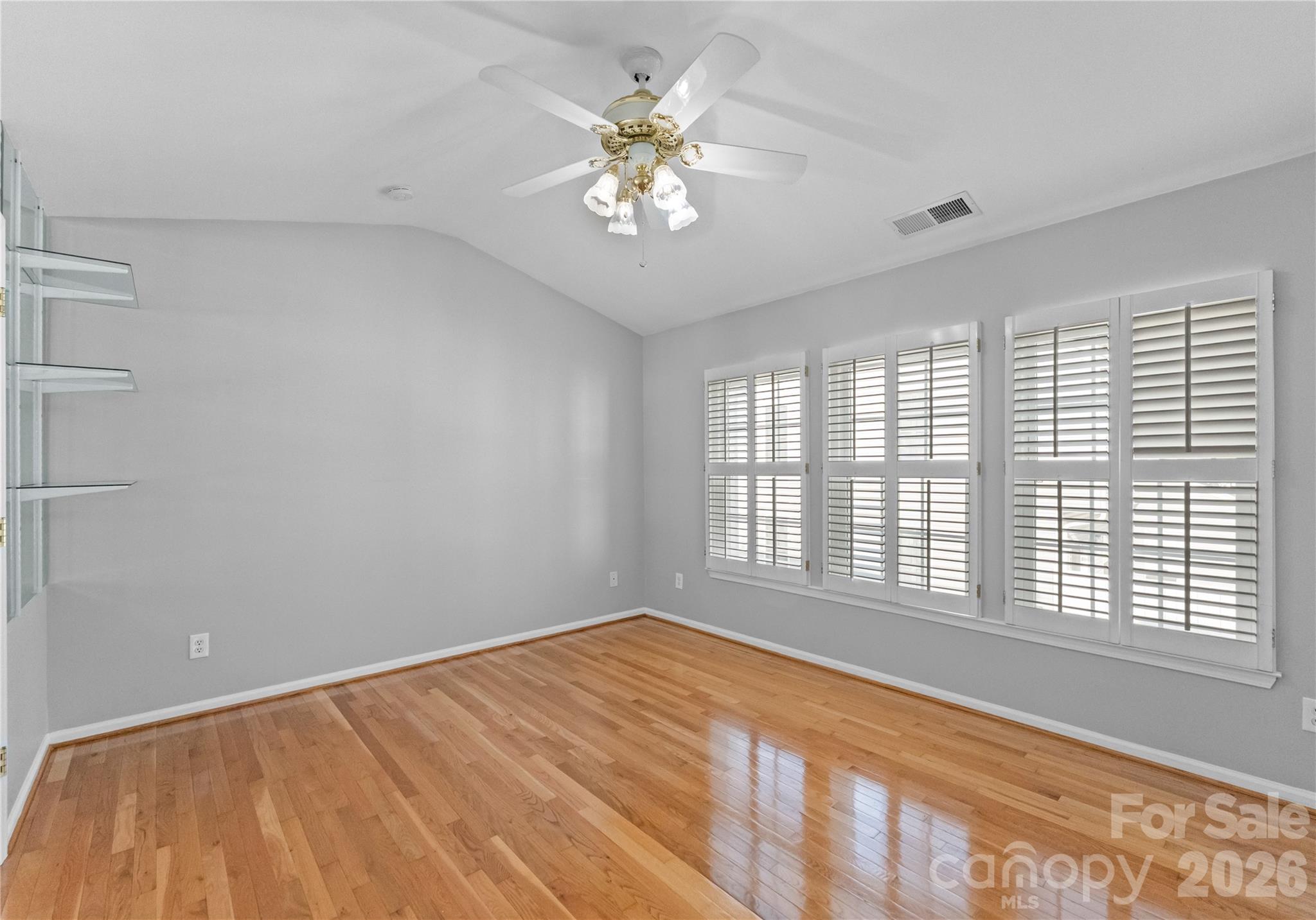 6776 Rothchild Drive Charlotte, NC 28270 - Photo 18 of 40 a view of an empty room with a window