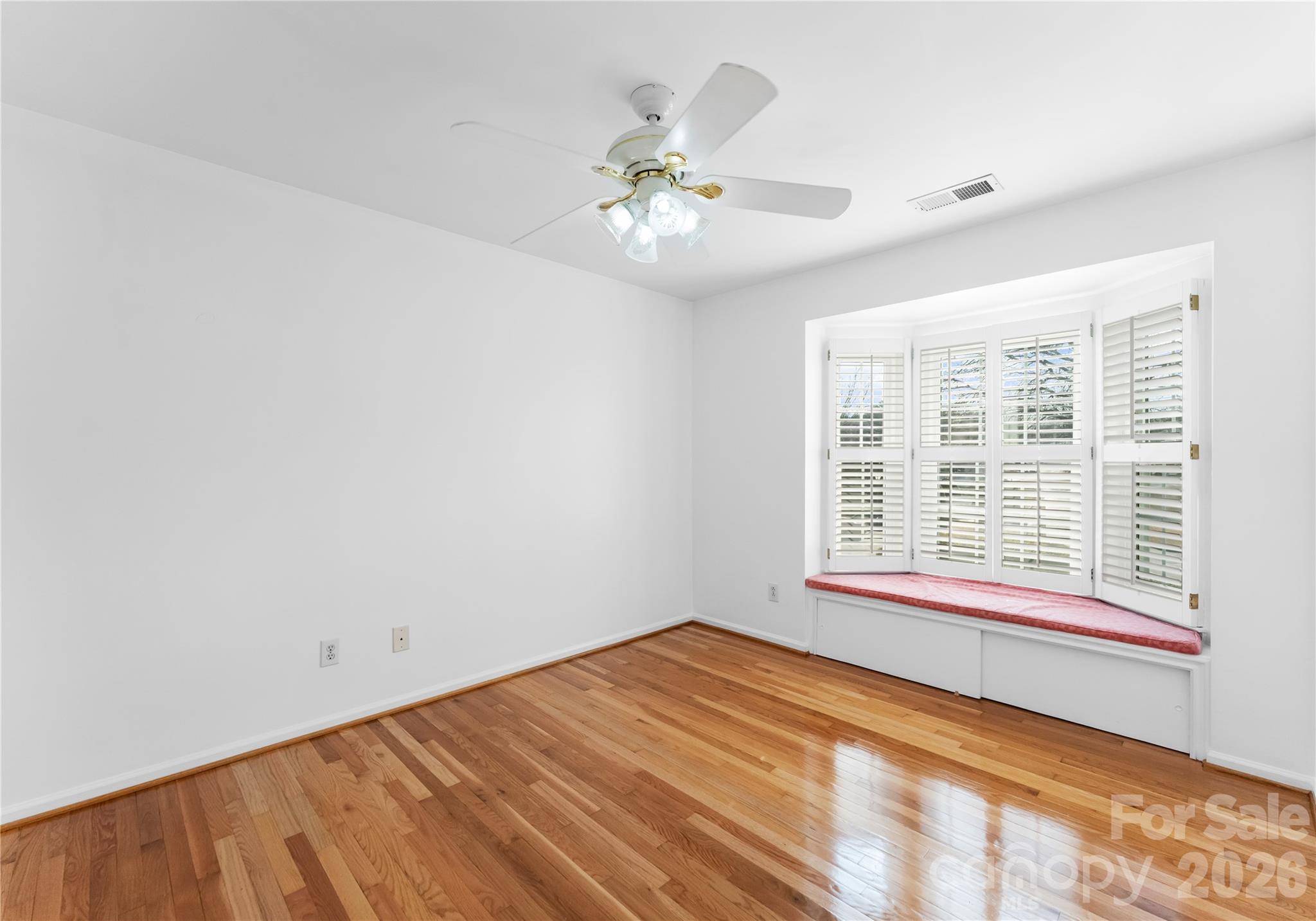 6776 Rothchild Drive Charlotte, NC 28270 - Photo 23 of 40 a view of an empty room with a window