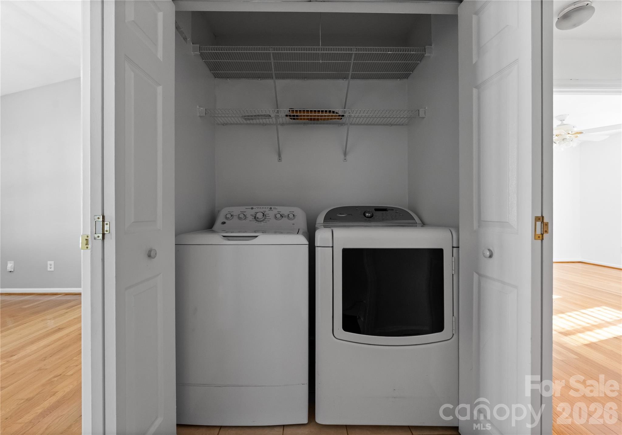 6776 Rothchild Drive Charlotte, NC 28270 - Photo 26 of 40 a utility room with dryer and washer