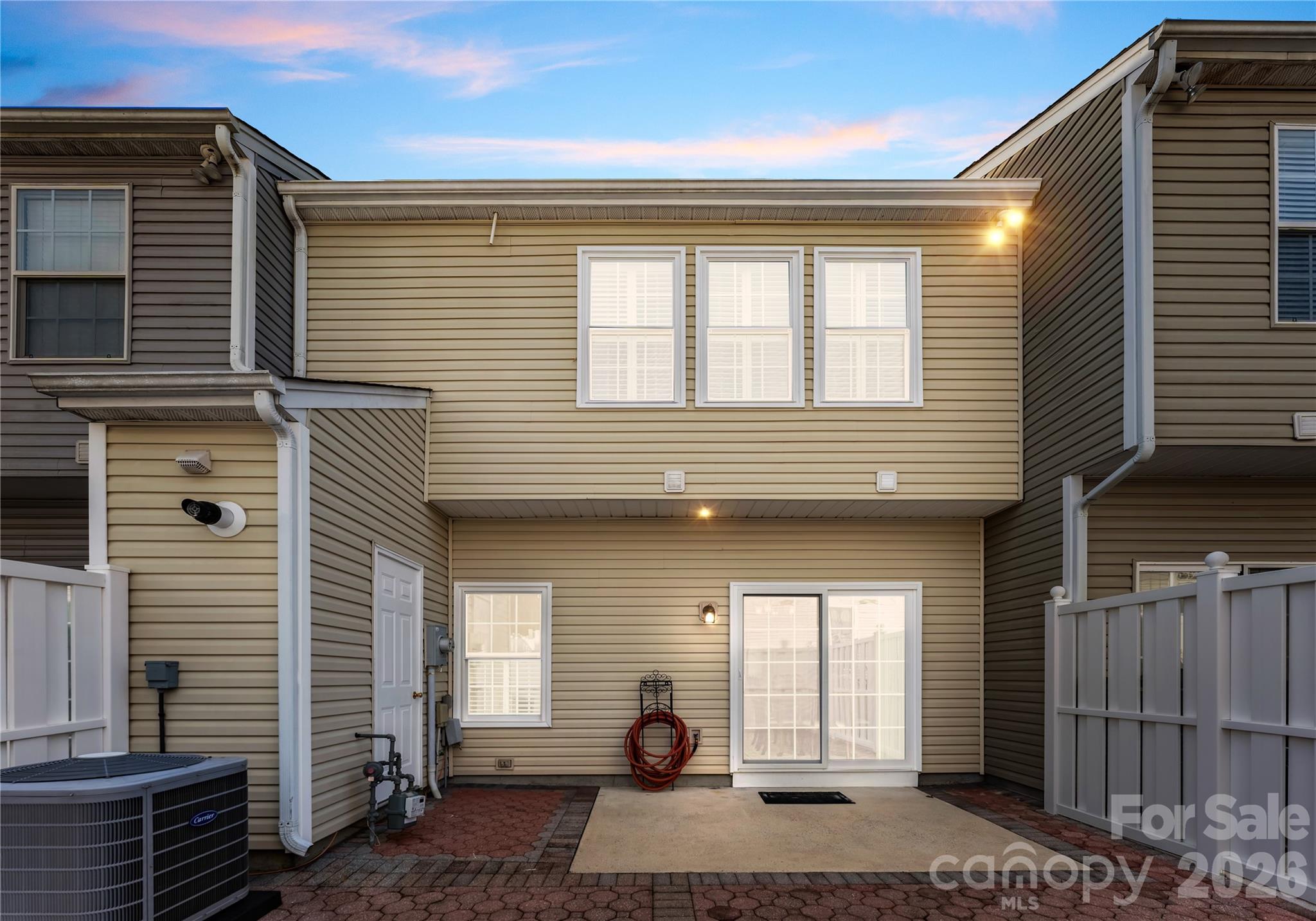 6776 Rothchild Drive Charlotte, NC 28270 - Photo 28 of 40 a front view of a house with a yard