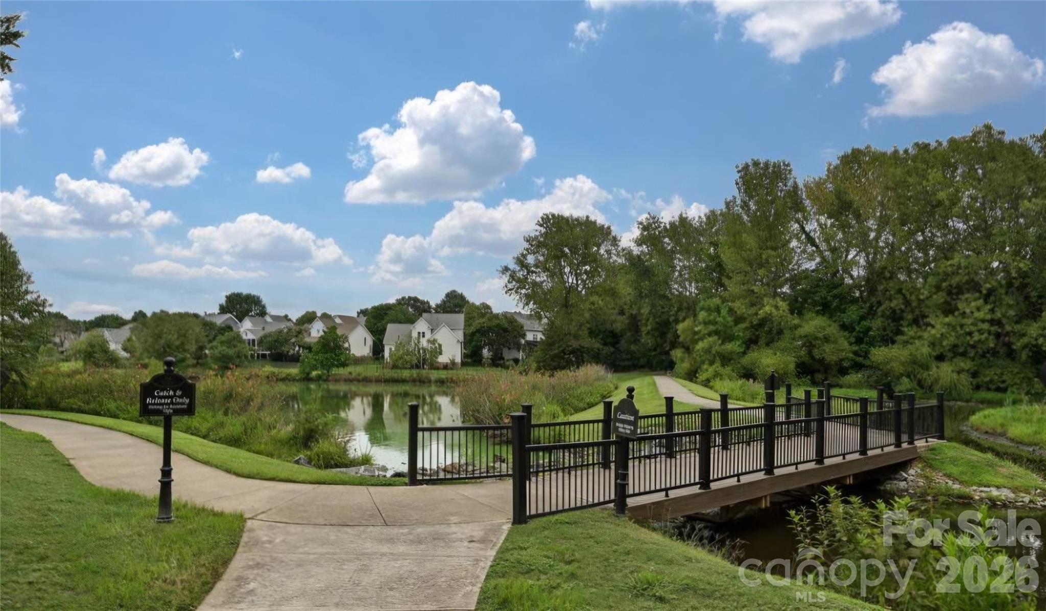 6776 Rothchild Drive Charlotte, NC 28270 - Photo 39 of 40 a view of a wrought iron fences in front of house