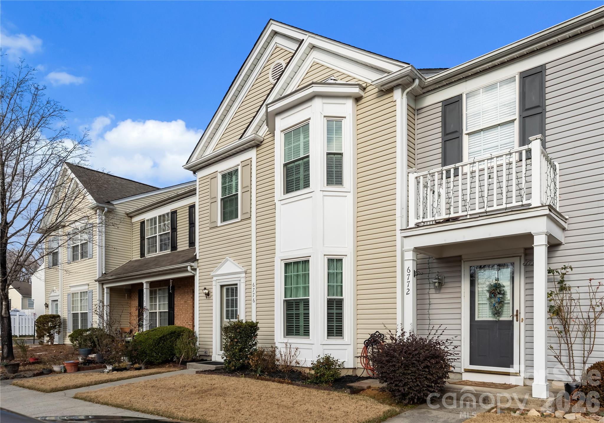 6776 Rothchild Drive Charlotte, NC 28270 - Photo 4 of 40 a view of a house with a yard