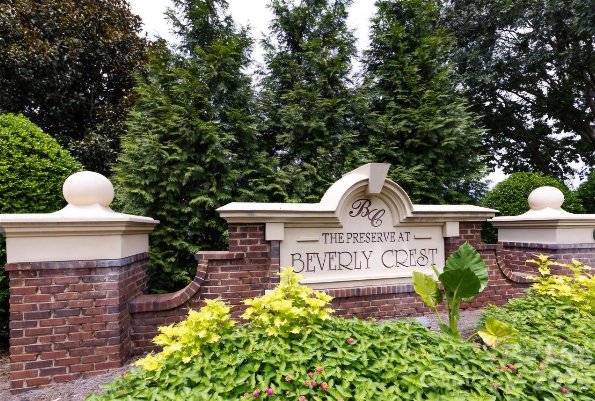 6776 Rothchild Drive Charlotte, NC 28270 - Photo 5 of 40 a view of a sign board with flower garden