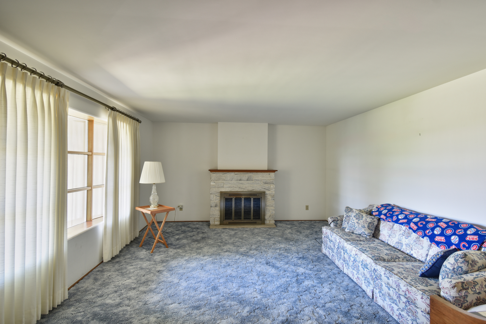 1542 East 18th Road Streator, IL 61364 - Photo 13 of 47 a living room with furniture and a fireplace