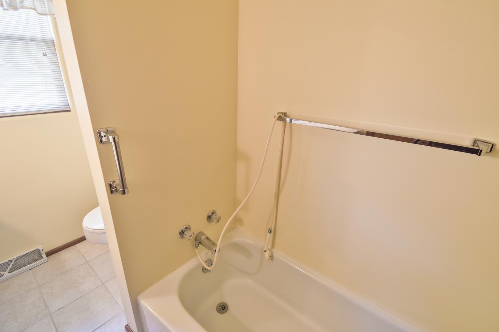 1542 East 18th Road Streator, IL 61364 - Photo 17 of 47 a bathroom with a sink a window and a glass door shower