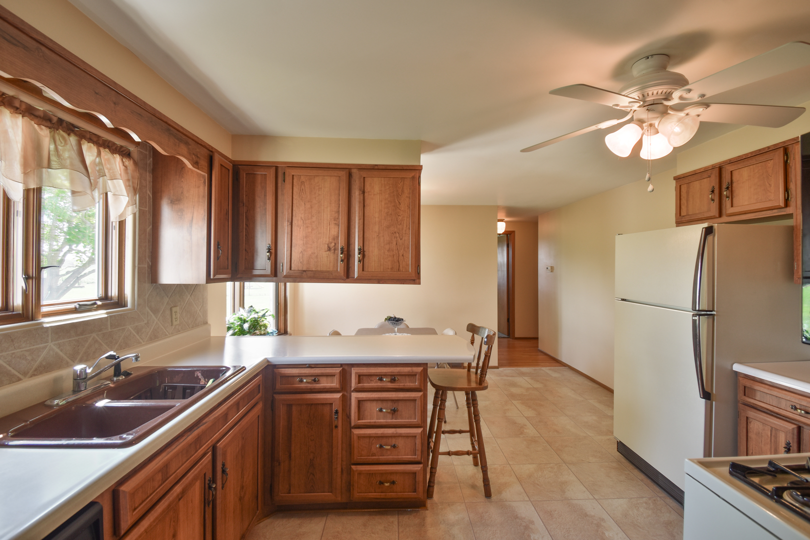1542 East 18th Road Streator, IL 61364 - Photo 10 of 47 a kitchen with a sink appliances and cabinets