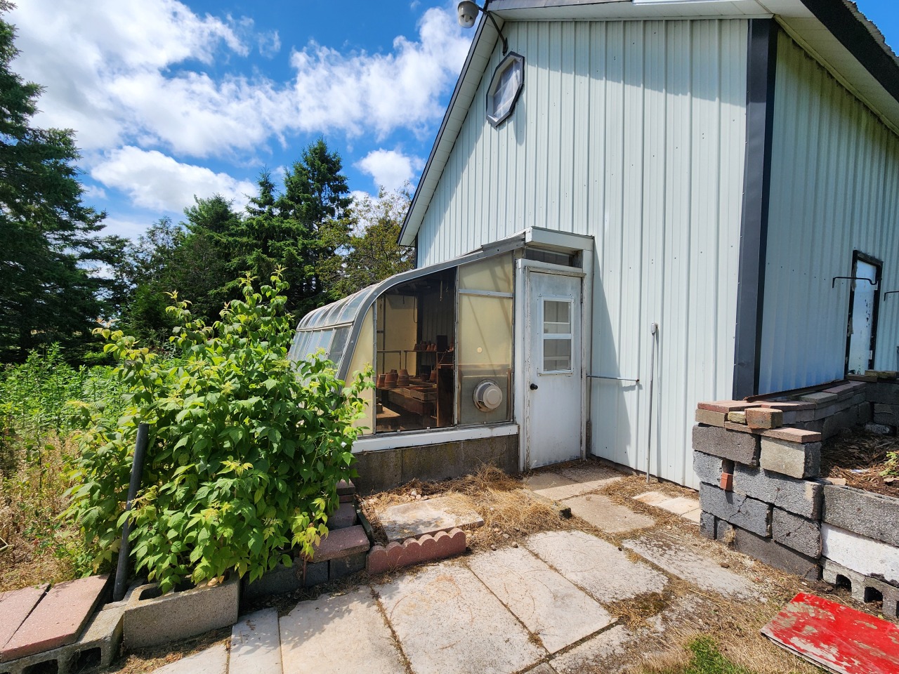 5609 Two Creeks Road Two Rivers, WI 54241 - Photo 41 of 45 Greenhouse off of barn