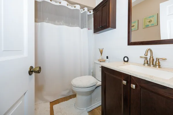 a bathroom with a sink and a toilet