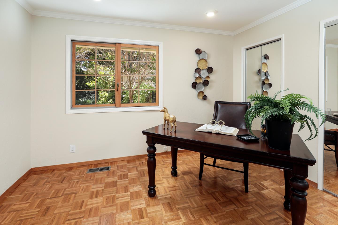 825 Parma Way Los Altos, CA 94024 - Photo 16 of 35 a workspace with furniture and a potted plant