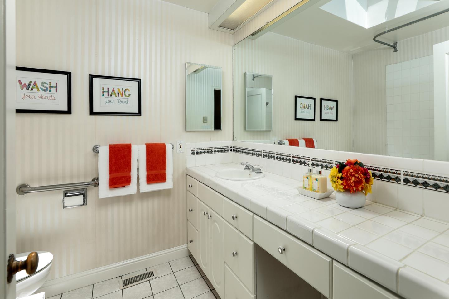 825 Parma Way Los Altos, CA 94024 - Photo 20 of 35 a bathroom with a sink and mirror