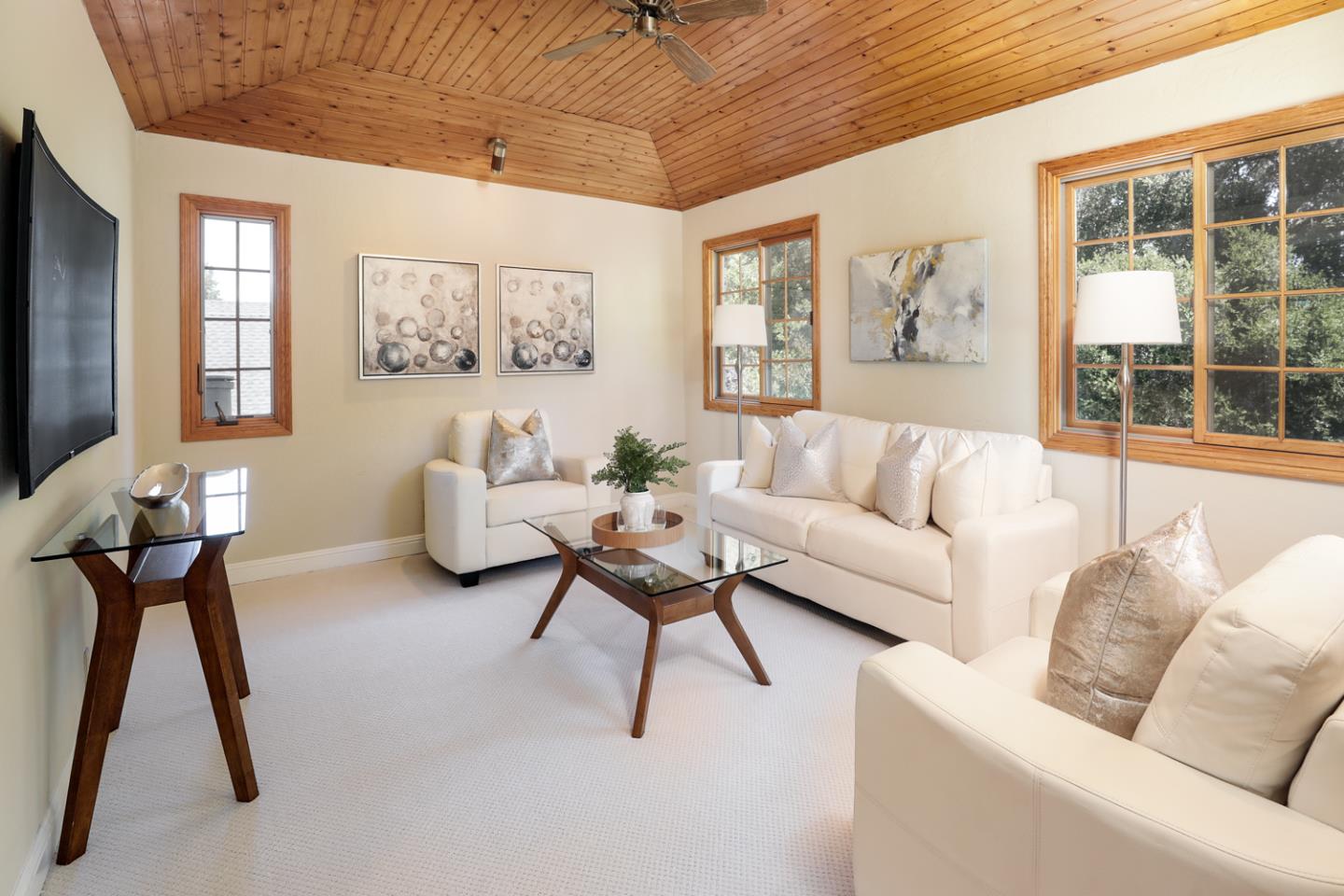 825 Parma Way Los Altos, CA 94024 - Photo 23 of 35 a living room with furniture a window and a flat screen tv