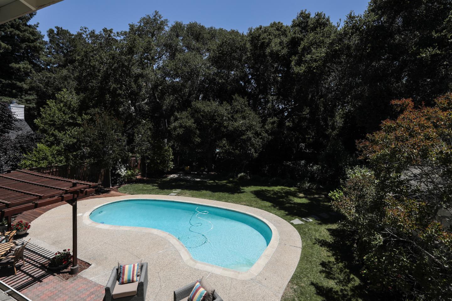 825 Parma Way Los Altos, CA 94024 - Photo 27 of 35 a view of a swimming pool with a yard