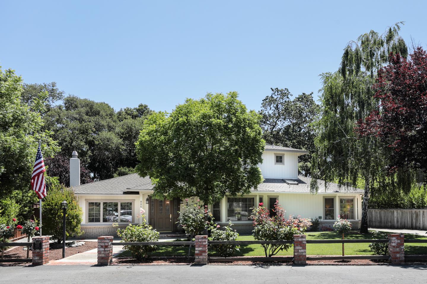 825 Parma Way Los Altos, CA 94024 - Photo 3 of 35 a front view of a house with garden