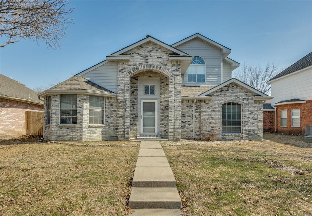 7954 Shield Road Frisco, TX 75035 - Photo 1 of 1 View of front of home with a shingled roof, a front yard, and brick siding