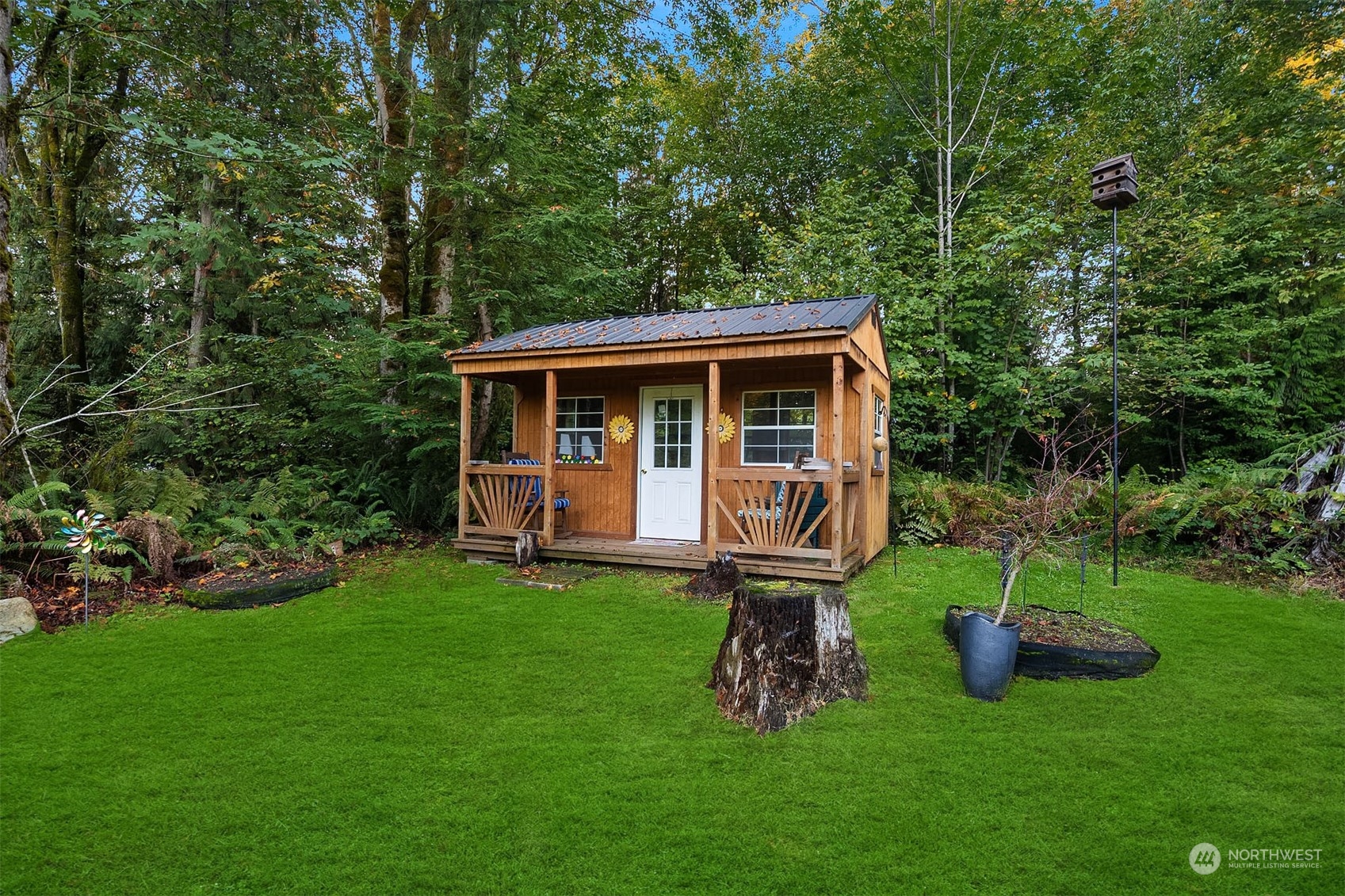 14741 209th Avenue Southeast Renton, WA 98059 - Photo 38 of 39 a view of a house with a yard and sitting area