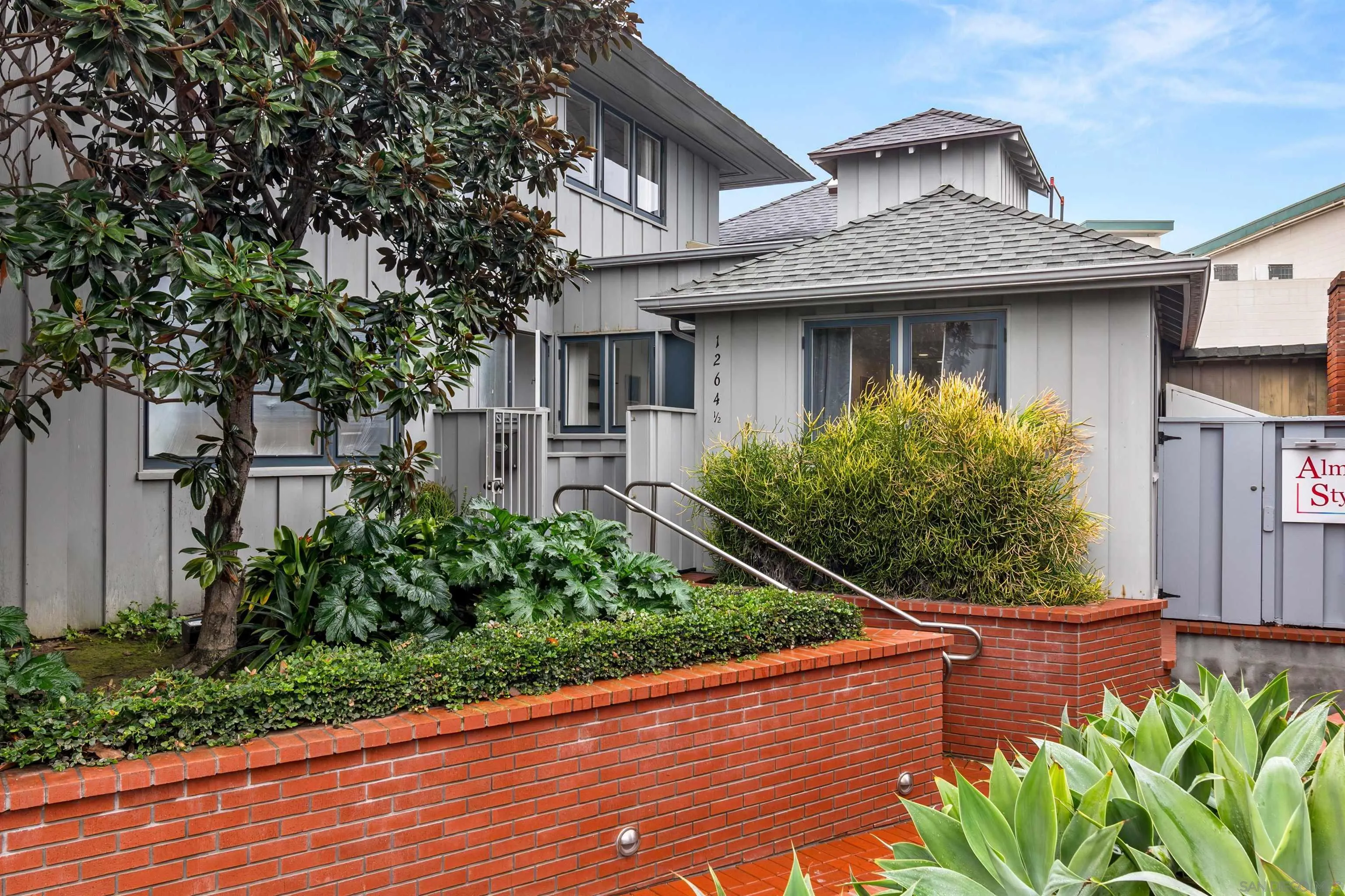 1264.5 Prospect Street La Jolla, CA 92037 - Photo 2 of 10 a front view of a house with plants