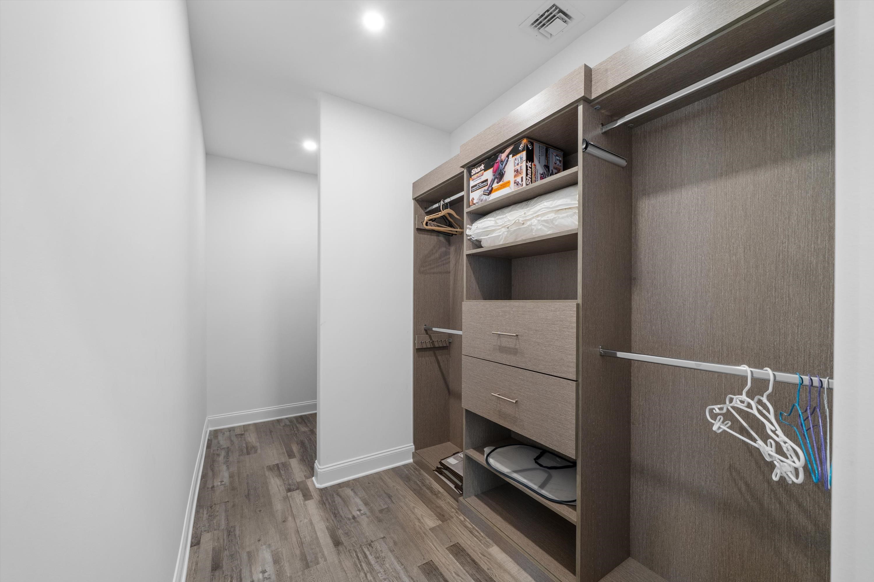 305 East Stockton Road Wildwood Crest, NJ 08260 - Photo 21 of 28 a view of walk in closet with clothes and shoes