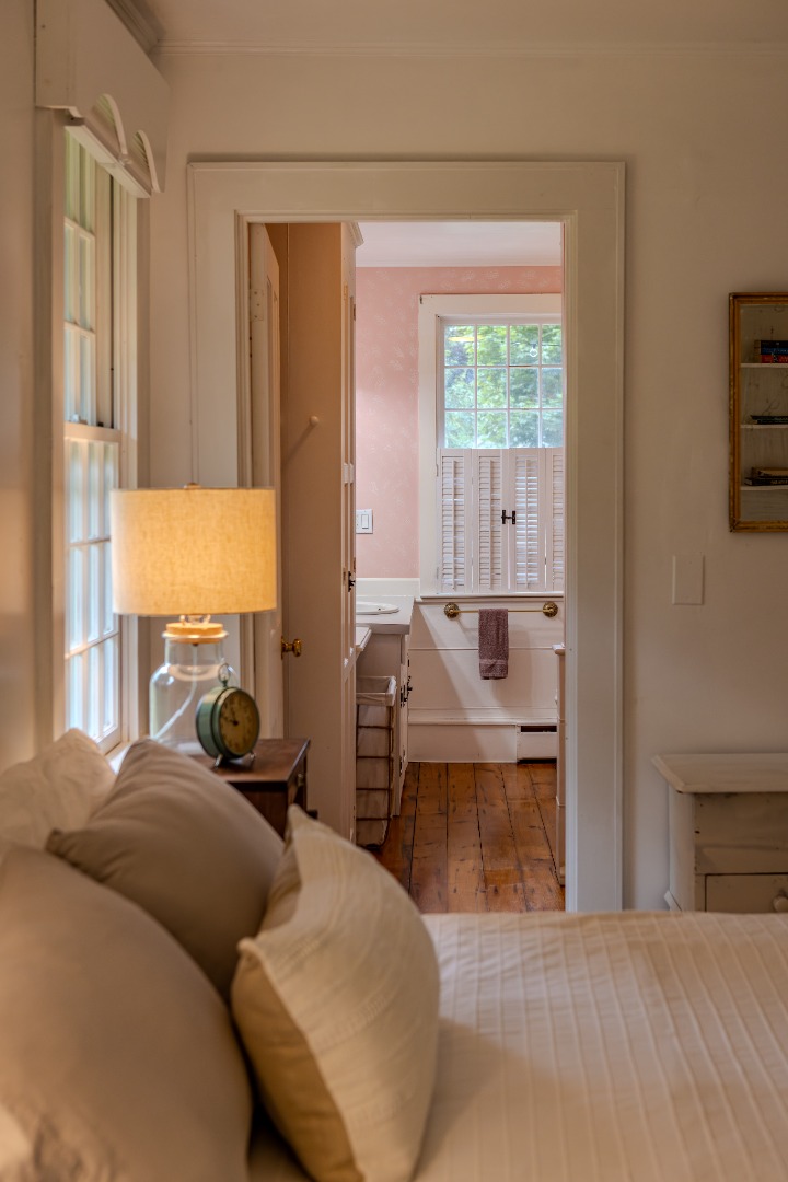 10 Danls Way West Tisbury, MA 02568 - Photo 13 of 41 a large bedroom with a bed and large window