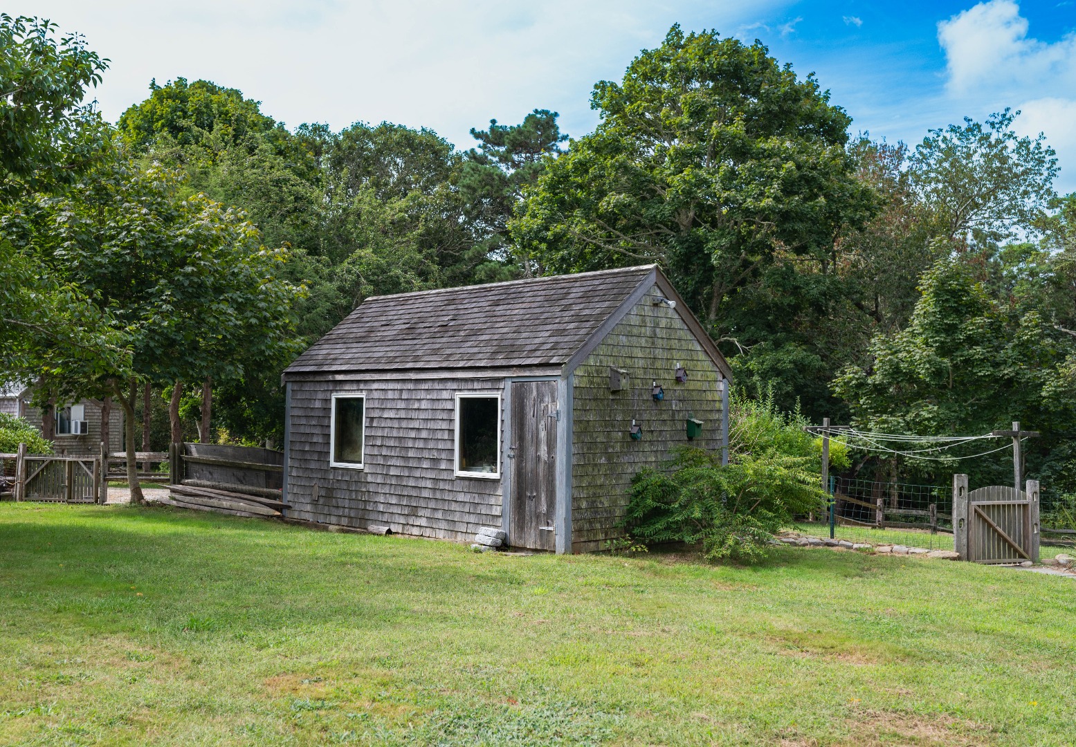 10 Danls Way West Tisbury, MA 02568 - Photo 26 of 41 a backyard of a house with lots of green space