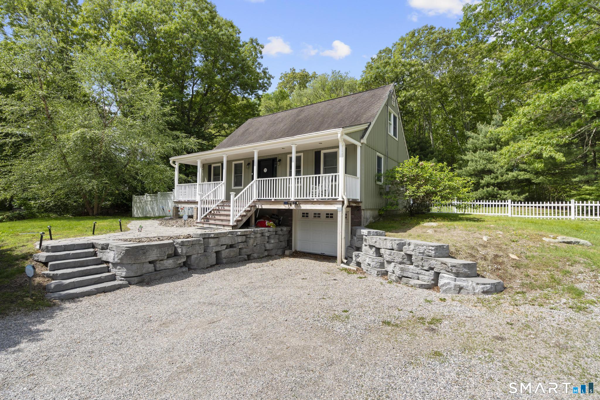 13 Christy Hill Road Ledyard, CT 06335 - Photo 1 of 38 a front view of a house with a yard