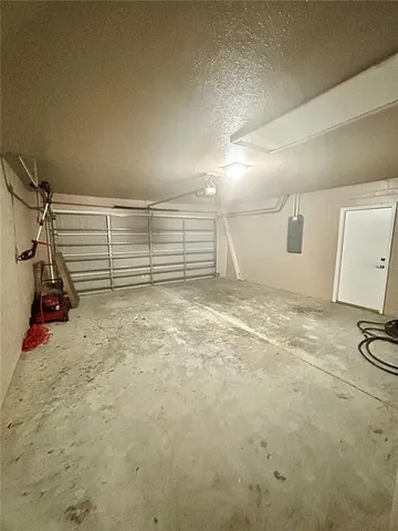 a kitchen with kitchen island granite countertop a sink and a stove