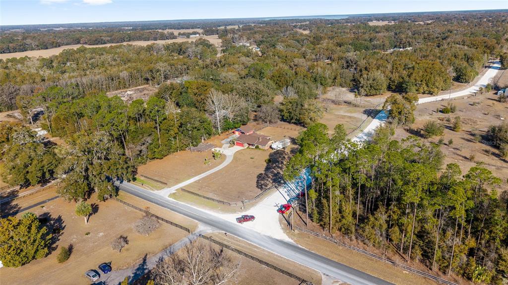 825 Northeast 165th Street Citra, FL 32113 - Photo 52 of 62 an aerial view of residential houses with outdoor space